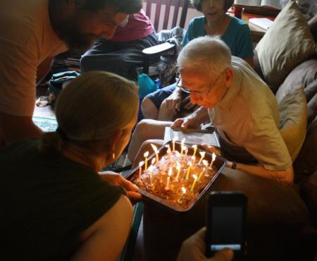 Grandpa and I blow out the candles | Photo by my brother, Ballard
